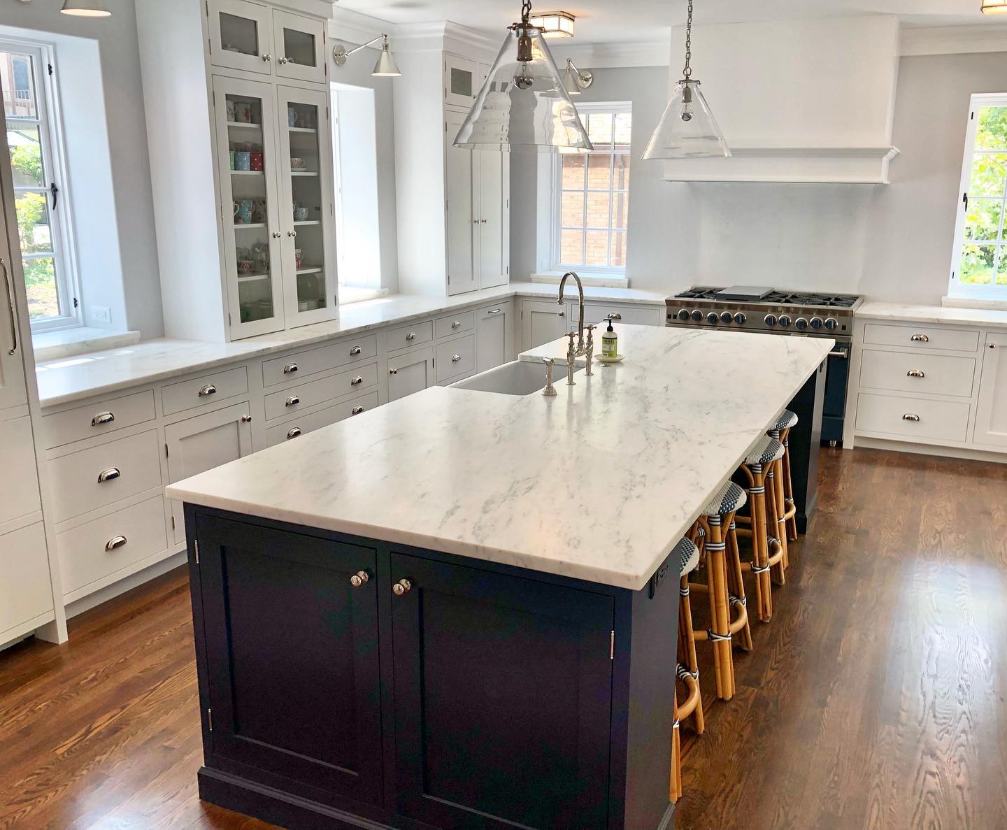 Finished kitchen with custom stone island and counters